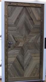 Haustür aus Altholz
Für eine ganz besondere Ausstrahlung sorgt diese Haustür aus verwittertem Holz. Hier verbinden sich Schlichtheit und Eleganz zu einem ganz  außergewöhnlichem Design.
Bild 1